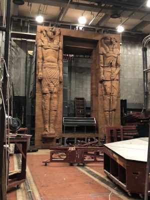 a backstage view of the Met Opera showing machinery and scenery
